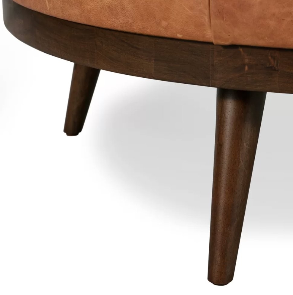 Rowland Genuine Leather Round Cocktail Ottoman - Image 1
