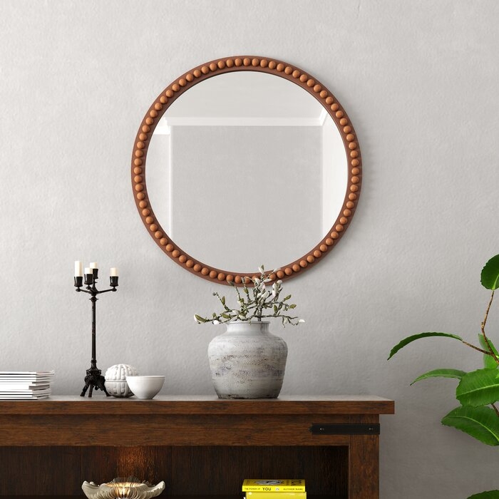 Aponi Round Wood Framed Wall Mounted Accent Mirror in Brown - Image 0