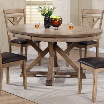 Carnspindle Round Butterfly Leaf Dining Table - Image 0