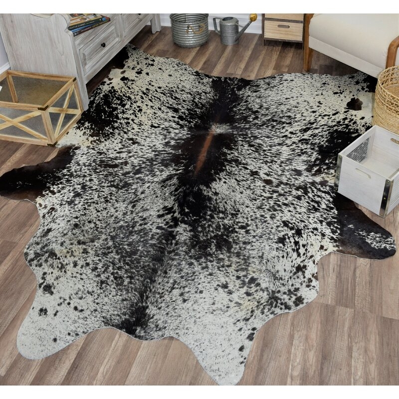 Millwood Pines Sarah Hand-Woven Cowhide Black/White Area Rug: 5' x 6'6" - Image 1