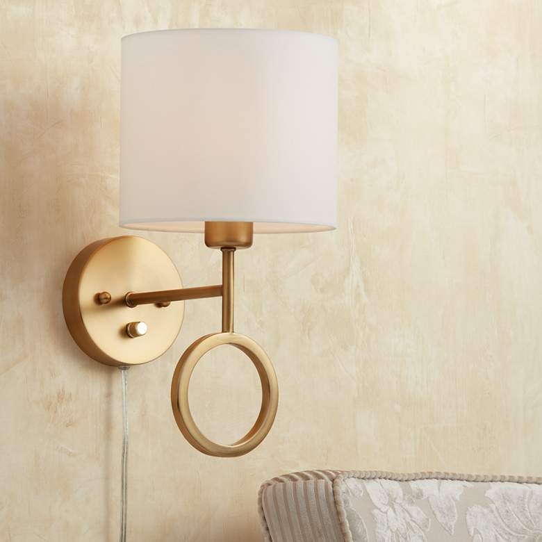 Amidon Warm Brass Drop Ring Plug-In Wall Lamp - Image 1