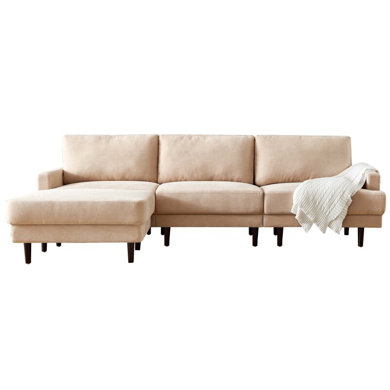 104.6" Wide Reversible Modular Sofa & Chaise with Ottoman - Image 0