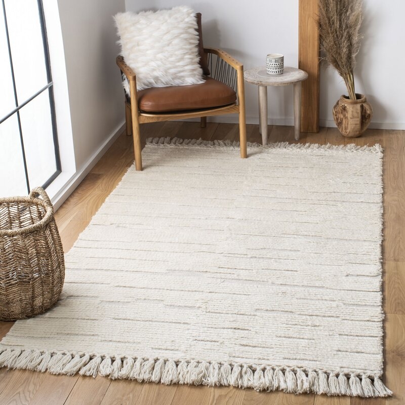 Hand Tufted Wool Ivory Area Rug - Image 0