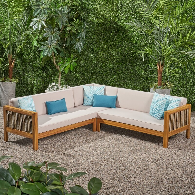 Kennison Patio Sectional with Cushions - Image 1