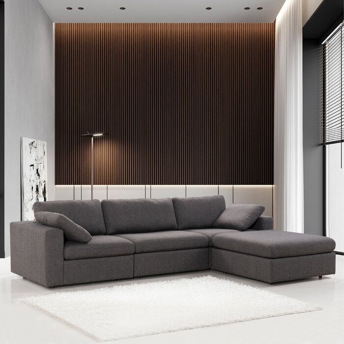 Matthew 121" Wide Reversible Modular Corner Sectional with Ottoman - Image 0