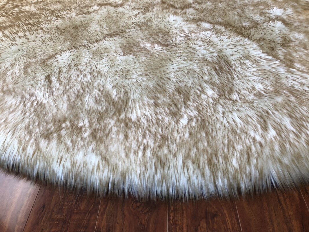 Whitlatch Luxurious Light Brown Area Rug - Image 1