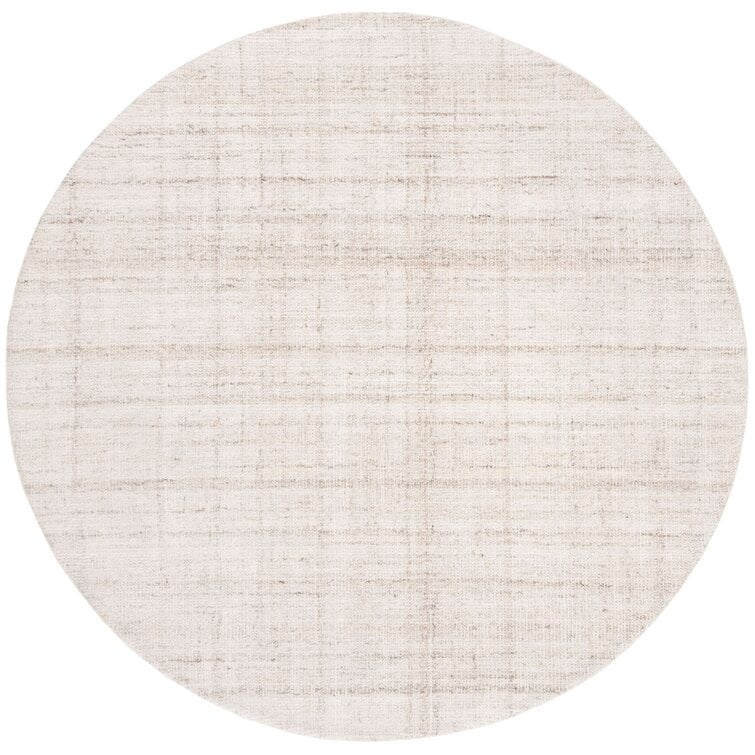 Gaten Handmade Tufted Ivory Area Rug - Image 0