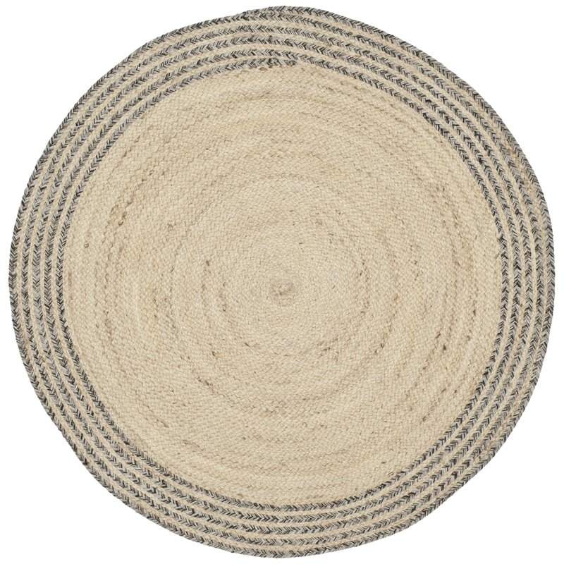 Abhay Hand Woven Ivory Area Rug - Image 1