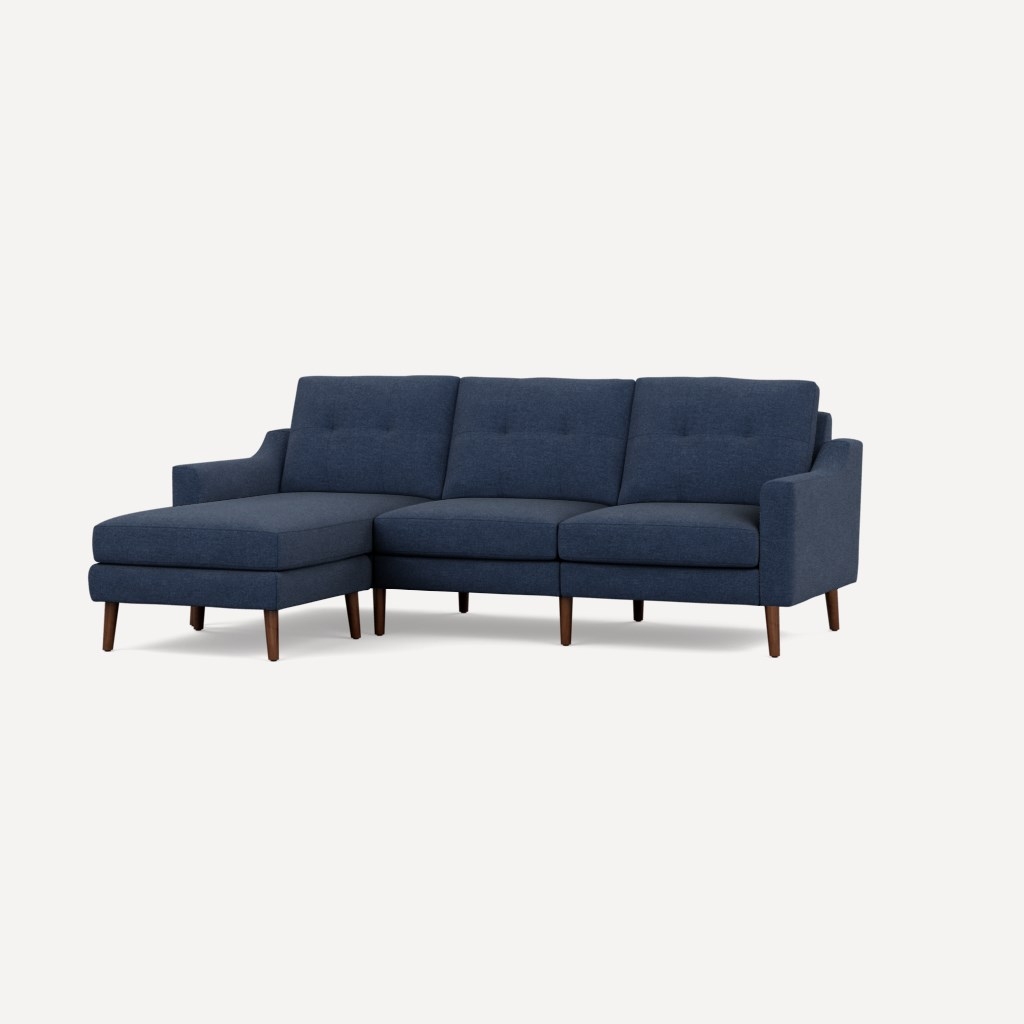 Nomad Sofa Sectional, Navy Blue with Walnut Legs, Low Arms, Reversible Chaise - Image 0