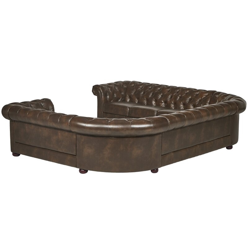Lucious 142" Wide Faux Leather Symmetrical Large Sectional - Image 6