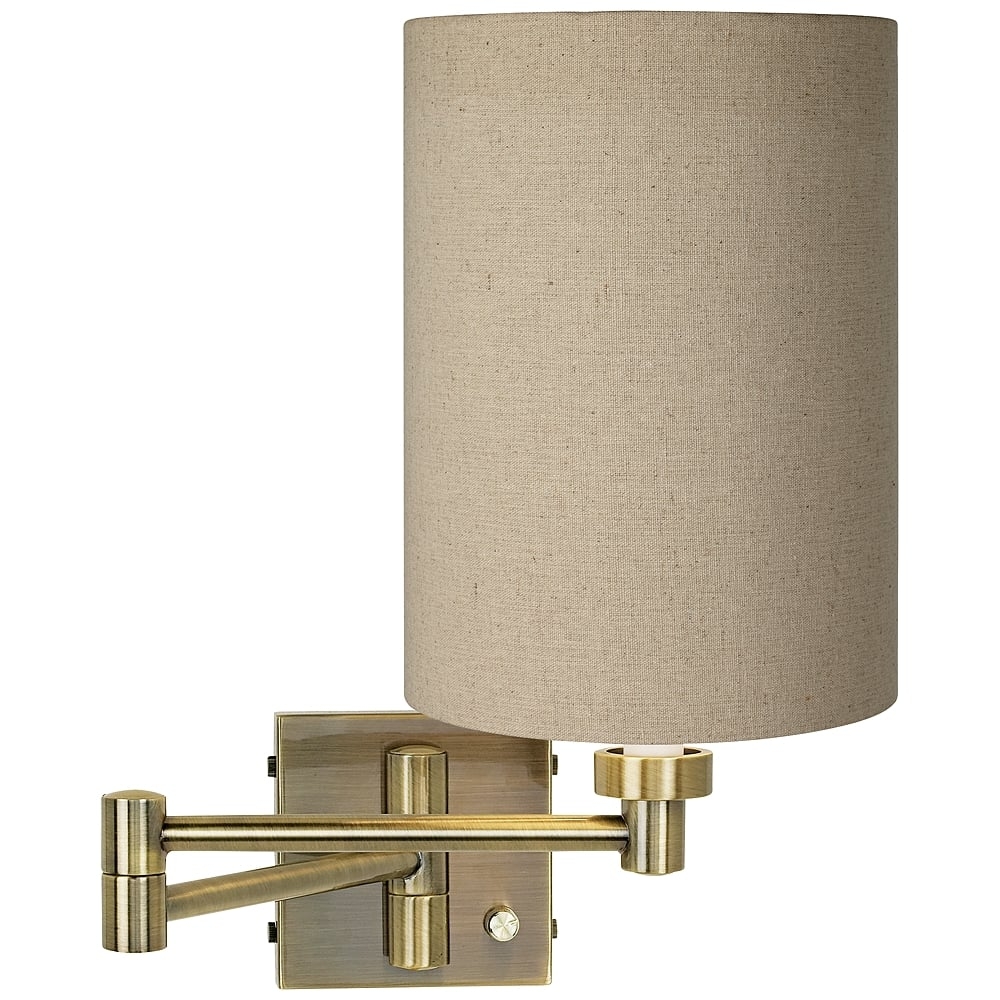 Barnes and Ivy Tan Shade Antique Brass Plug-In Swing Arm Wall Light - Image 0