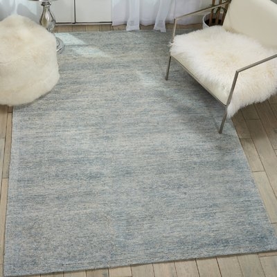 Romans Solid Hand-Tufted Aquamarine Blue Area Rug - Image 0