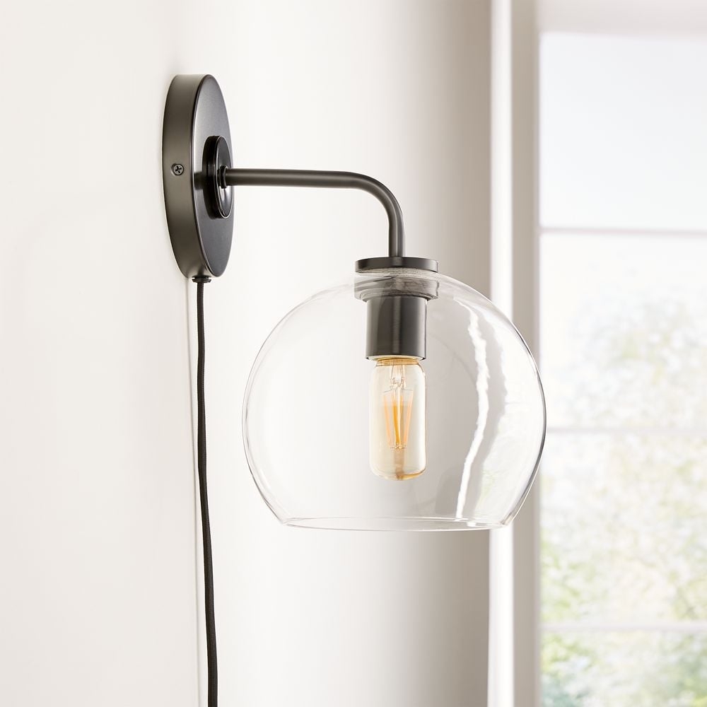 Arren Black Plug In Wall Sconce Light with Clear Round Shade - Image 0
