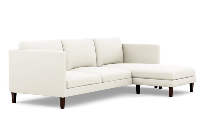 Oliver Reversible Sectional with White Ivory Fabric, right facing chaise, and Oiled Walnut legs - Image 1