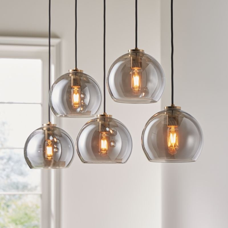 Arren Brass 5-Light Linear Pendant with Round Silver Glass Shades 42" - Image 0