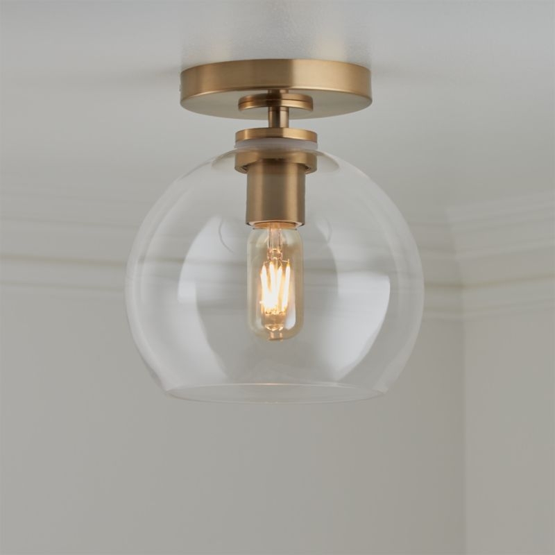 Arren Brass Flush Mount Light with Clear Round Shade - Image 1