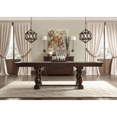 Donnellson Extendable Solid Wood Dining Table - Image 1