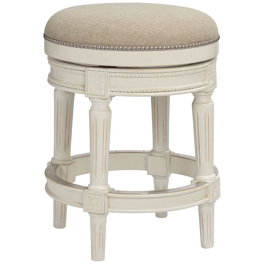 Oliver 24 1/2" Cream Fabric Backless Swivel Seat Counter Stool - Image 0