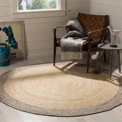 Abhay Hand Woven Ivory Area Rug - Image 0
