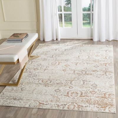Spence Power Loomed Cream/Brown Area Rug - Image 0