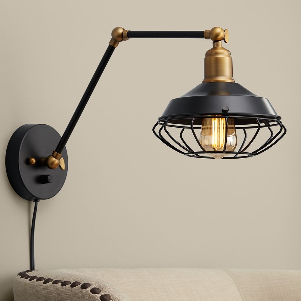 Zelda Matte Black and Gold Industial Cage Wall Lamp - Style # 55K56 - Image 0