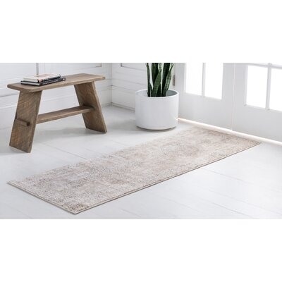 Caiden Beige Area Rug - Image 0