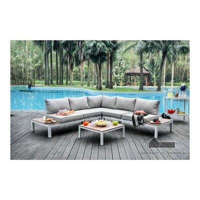 Winona Patio Sectional with Cushions - Image 0