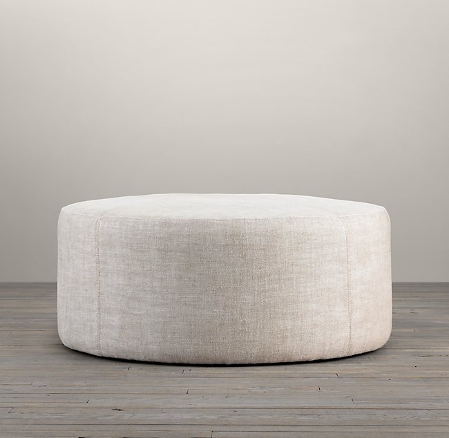 36" COOPER UPHOLSTERED ROUND OTTOMAN - Image 0