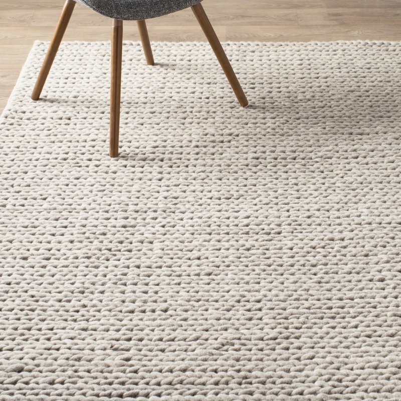 Arviso Hand-Woven Wool Off White Area Rug - Image 1