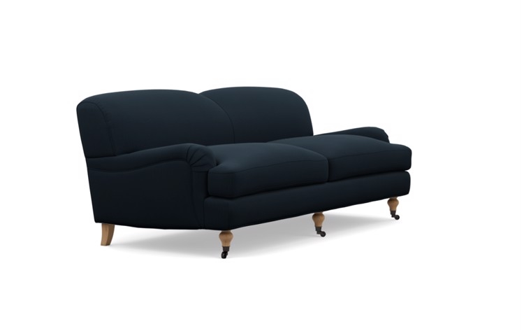 Rose by The Everygirl Sofa in Midnight Blue Fabric with White Oak with Antiqued Caster legs - Image 1