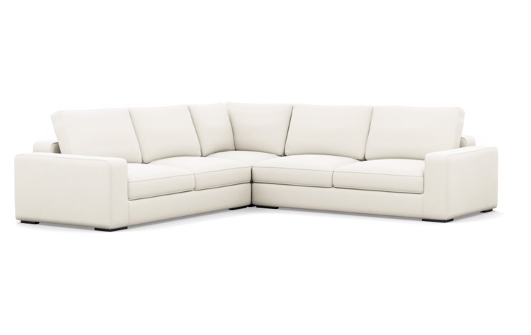 Ainsley Sectionals with Corner Sectionals in Ivory Fabric with Matte Black legs - Image 1