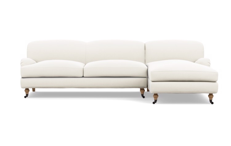 Rose by The Everygirl Chaise Sectional in Ivory Fabric with White Oak with Antiqued Caster legs - Image 0