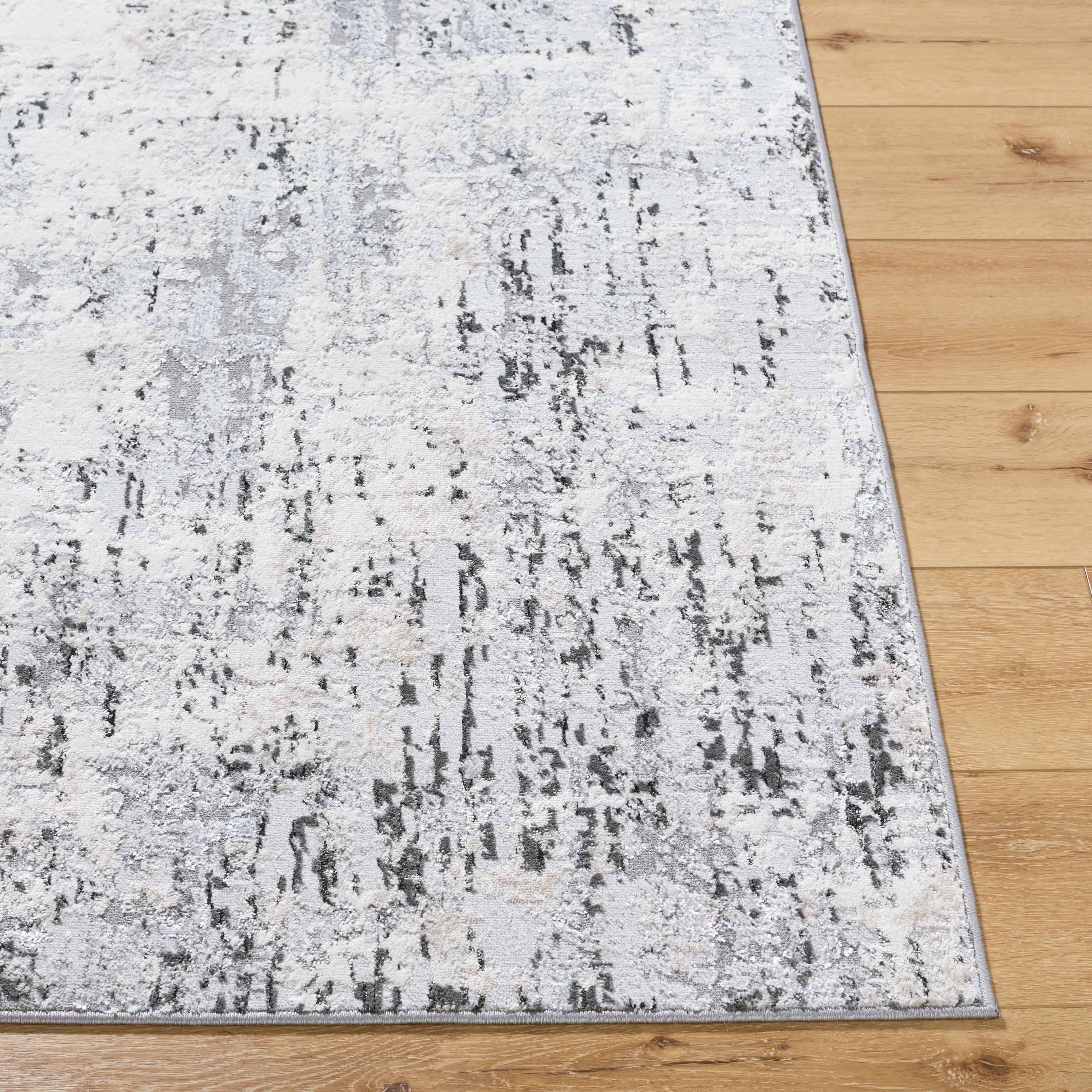 Lustro Gray Indoor 5'3" x 7' Machine Woven Rug - Image 1