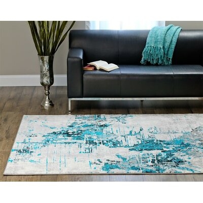 Brittni Abstract Turquoise Area Rug - Image 0