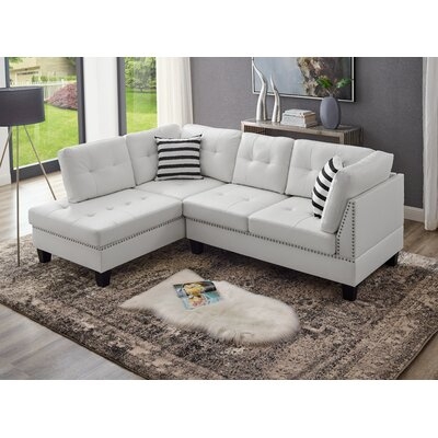 Aaric 90" Faux Leather Left Hand Facing Sofa & Chaise - Image 0