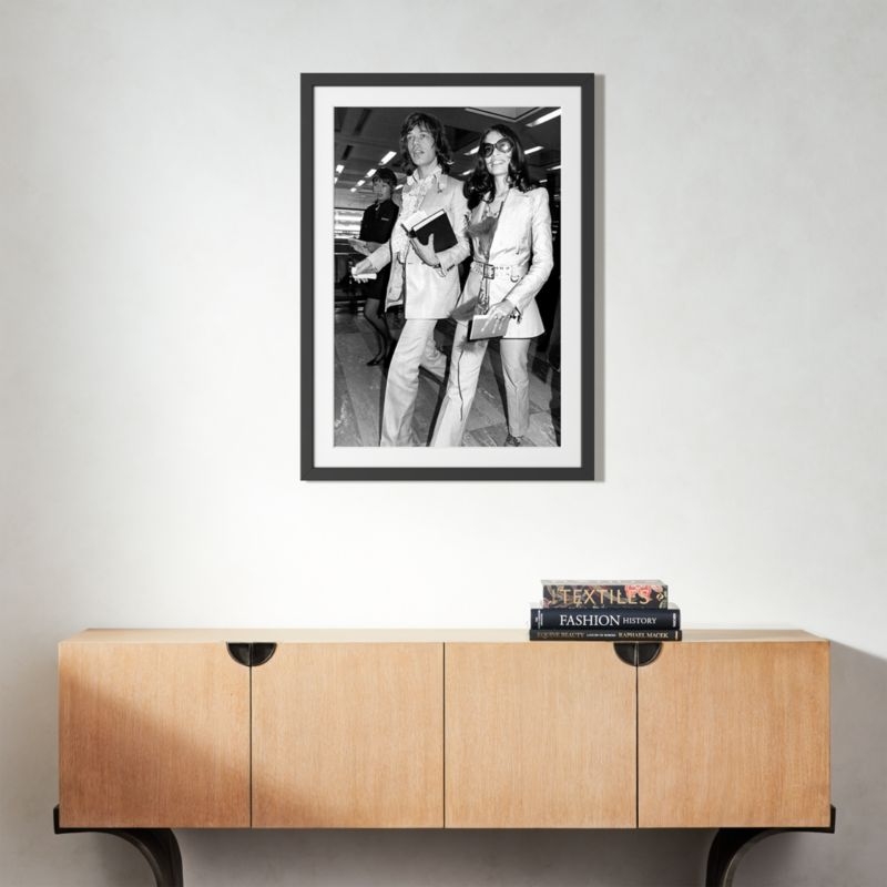 'Mick and Bianca at the London Airport, 1970' Photographic Print in Black Frame 27"x38" - Image 1