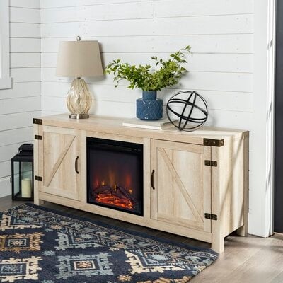 Adalberto TV Stand for TVs up to 65" with Fireplace Included - Image 0