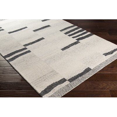 Uptown Striped Handmade Tufted Wool Cream/Black Area Rug - Image 1