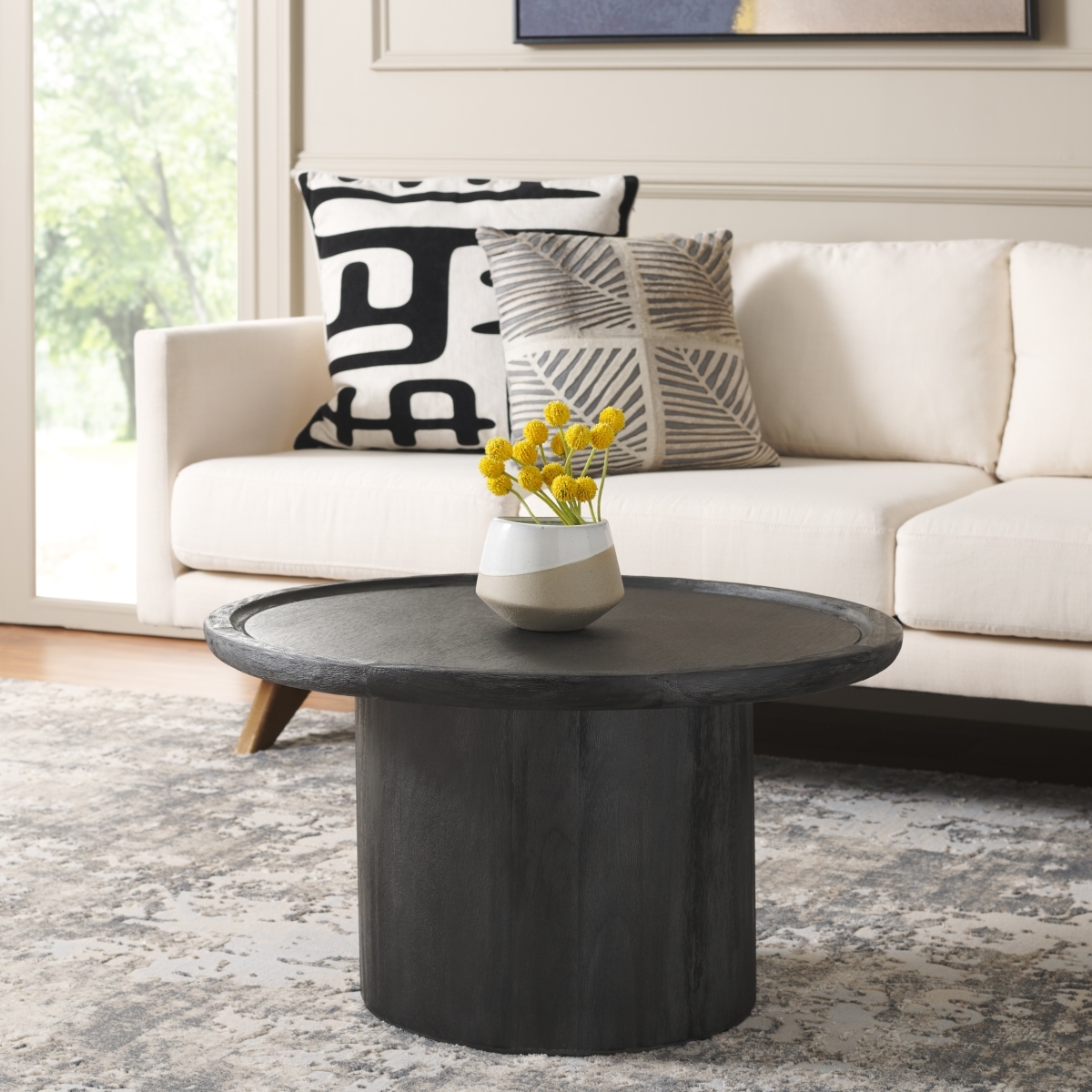 Devin Round Coffee Table - Black With White Wash Distress - Safavieh - Image 1