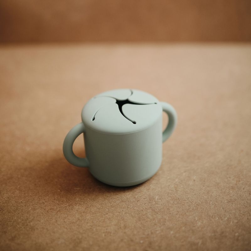 Mushie Green Silicone Baby Snack Cup - Image 1