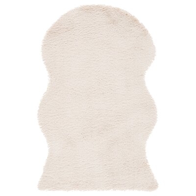 Vartavar Beige Area Rug - Image 0