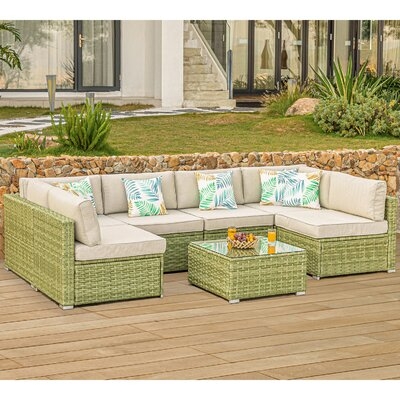 Virgil 7 Piece Rattan Sectional Seating Group with Cushions - Image 0