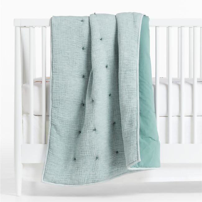 Aire Crinkle Blue Organic Cotton Baby Crib Quilt - Image 1