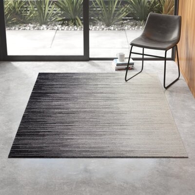 Stagner Abstract Black Area Rug - Image 0