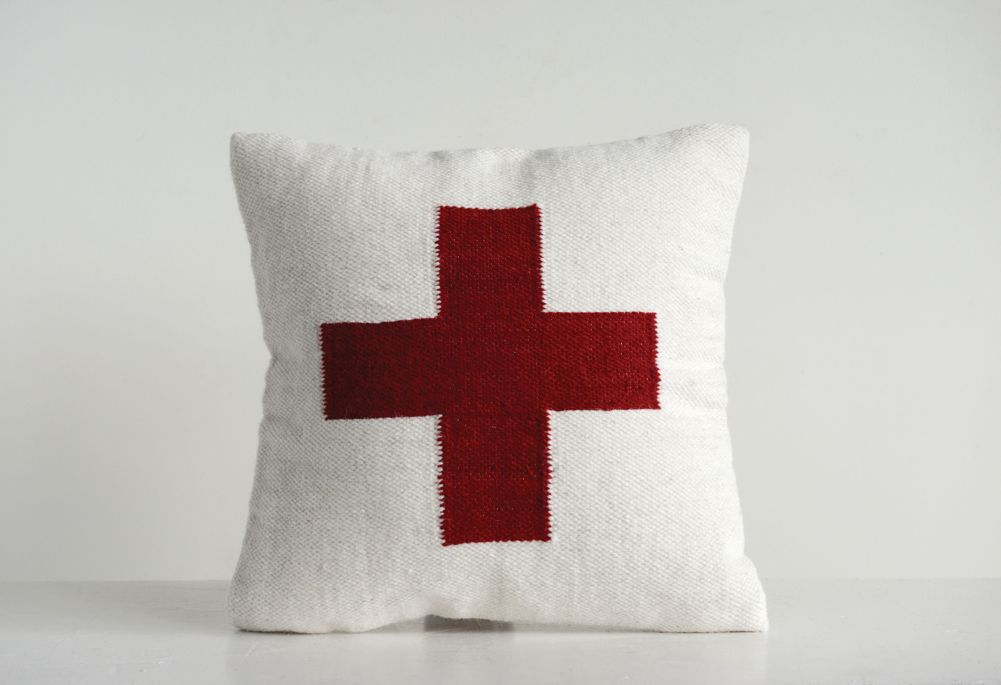 Square Cream Wool Blend Pillow with Red Cross - Image 0