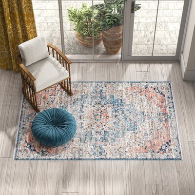 Deja Oriental Blue/Red/Tan Area Rug - Image 1