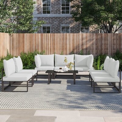Annemarie Outdoor Patio 8 Piece Sectional Seating Group with Cushions - Image 0