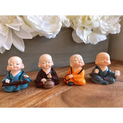 Mini Buddha Figurines Set Of 4 - Image 0