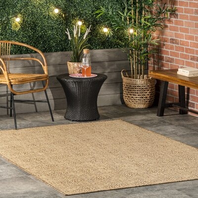 Indoor/Outdoor Beige Area Rug - Image 0