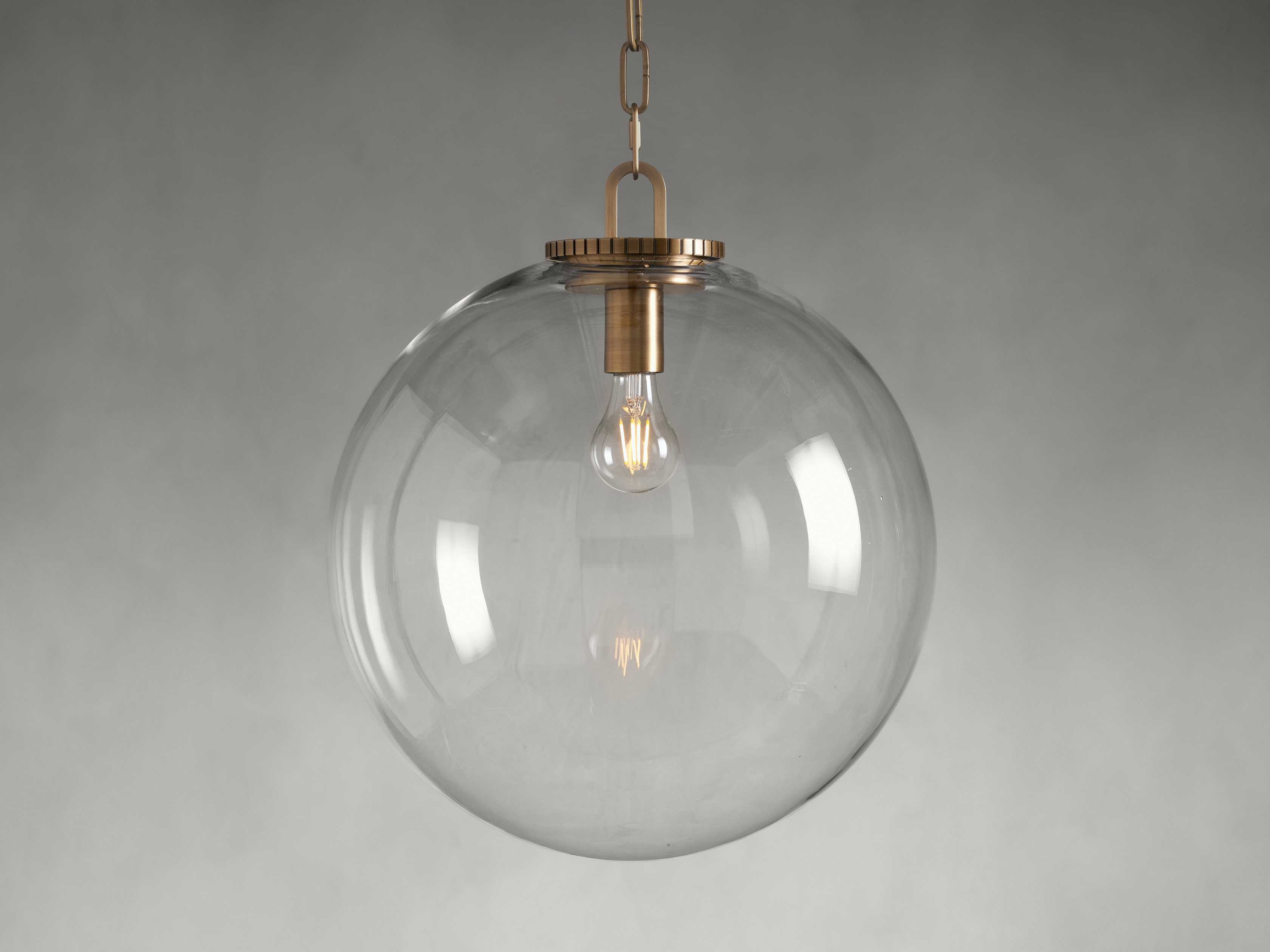 Wescott Globe Pendant with Chain in Glass Large Brass /Clear - Image 0